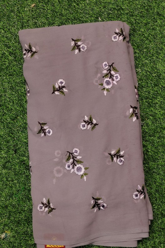 Magnetic Muted Brown Geogette Fabric With Semi Geo Work